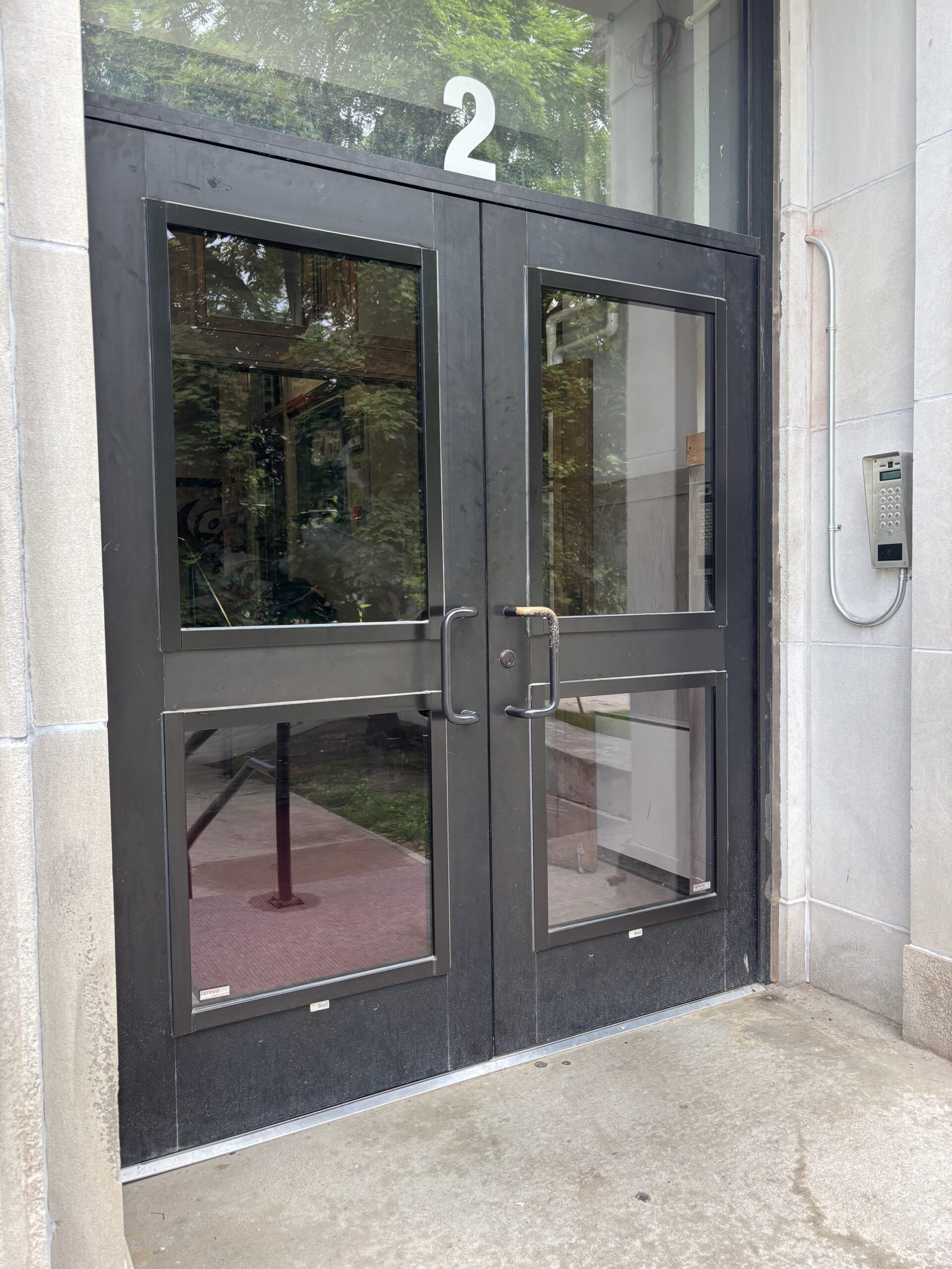 School doors equipped with DefenseLite panels for superior security and protection
